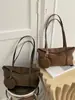Nova Bolsa de Mão Feminina Outono 2026 Bolsa Tote de Alta Qualidade para o Dia a Dia com Grande Capacidade e Alça de Ombro