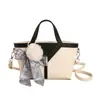 Bolso cubo pequeño estampado de lichi para mujer 2026 Otoño/Invierno Nuevo Estilo Nicho Bolso de mano para el trabajo Bolso pequeño de hombro cruzado tipo cesta de verduras