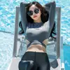 Nuevo traje de snorkel de manga larga dividido para mujer, traje de baño corto para natación al aire libre en la playa, contra medusas
