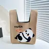 Guofeng Bolsa de mão panda gigante Bolsa de malha explosiva Bolsa de mão de tecido combinando com tudo Nova bolsa de presente que acompanha o presente