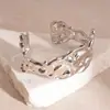 Pulseras Metálicas Geométricas Irregulares Transfronterizas Europeas y Americanas, Pulseras de Moda y Personalizadas, Joyería de Mano de Lujo Ligero y Gama Alta, Diseño de Nicho