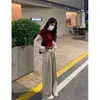 Una generación de camiseta de hombro vino tinto para el cabello femenina chica caliente chaqueta corta ajustada verano Joker ajustada de manga corta