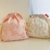 Pequeña bolsa de almacenamiento de algodón popelina floral con cordón bolsa de tela venta al por mayor de fábrica