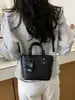 2026 popular nuevo bolso de hombro cruzado con textura de moda, bolso de mano tipo cubo vintage de gran capacidad con textura para mujer
