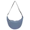 Bolsa esportiva externa em formato de bolinho transfronteiriça, bolsa transversal de nylon simples e casual para mulheres, leve para passeios, deslocamentos e ciclismo