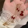 Versión de Alta Gama del Collar con Forma de Calabaza para Mujer, Chapado en Oro Champagne, Colgante de Ágata Roja, Microincrustado con Diamantes, Cadena Larga Doble Uso para Suéter para Mujer, Hecho de Cobre