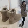 Botas de nieve de suela gruesa para mujer, nuevo estilo de invierno 2026, forradas de felpa y engrosadas para abrigar, antideslizantes y resistentes al frío, botas grandes de algodón para el Noreste