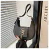 Bolsa Feminina Nova Tendência 2026 Casual Retrô de Nicho Versátil Moda Bolsa de Ombro de Mão Bolsa Tote de Alta Qualidade para Sobrancelha