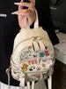 Mochila Pequena Graffiti de Nicho para Mulheres 2025 Nova Moda Verão Fofa Grande Capacidade Estilo Coreano Mochila de Viagem