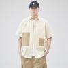 Camisa de verano de manga corta con costuras personalizadas para hombre, camisa de media manga para adolescentes, camisa negra holgada y combinable, estilo Hong Kong.