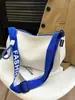 Bolsa Casual de Lona de Nylon de Grande Capacidade para Mulheres 2025 Nova Moda Bolsa de Ombro Versátil com Alça Larga Transversal Bolsa Almofada