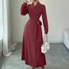 Ropa Femenina Transfronteriza Europea y Americana Otoño/Invierno 2026 Solapa Manga Larga Cintura Ceñida Larga para Viaje Estilo Traje Gabardina Abrigo