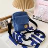 Bolsa pequena fofa para mulheres 2024 nova moda vigorosa menina estudante bolsa para celular estilo japonês bolsa de lona crossbody fresca