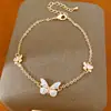Pulsera de mariposa con incrustaciones de circonita y baño de oro real de 14k, brazalete de nicho de lujo ligero, joyería de moda dulce y elegante