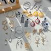 Em estoque Brincos longos geométricos incrustados de diamantes brincos de design de nicho feminino brincos de temperamento personalizados estilo japonês e coreano atacado