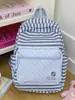 Mochila con estampado de rayas estilo coreano, moderna y versátil, mochila de nicho estilo Ins para estudiantes de secundaria, preparatoria y universidad