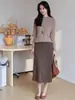 Falda midi elegante de acetato y lana estilo francés Yunshuyaxu, de cintura alta, línea A, que cubre la cadera, adelgazante y fluida para el trabajo
