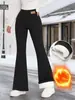 Pantalones acampanados con forro polar y parche de cuero estilo transfronterizo para mujer, nuevos para otoño e invierno, de cintura alta, adelgazantes, microacampanados, jeans, venta al por mayor directa de fábrica, ropa para mujer