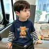 Camiseta de manga larga para niño, nuevo modelo otoño 2026, playera básica de algodón puro para niños, top estiloso para niños, dos piezas para primavera y otoño