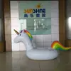 Suministro de fábrica en stock 2 metros flotador inflable de unicornio, PVC inflable niños unicornio inflable montable cama flotante