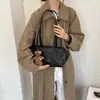 Bolsa de Axila Feminina Nova Estilo Outono/Inverno 2026 Moda High-End Estilo Melade Grande Capacidade Casual Moda Bolsa de Ombro