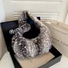 Bolso de mujer transfronterizo de gran capacidad, nuevo modelo de moda otoño 2026, bandolera versátil para el día a día, bolso de peluche tipo dumpling