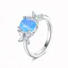 Popular Amazon europeo y americano exquisito mariposa circón incrustado productos genuinos ópalo lujo elegante anillo de plata todo partido para mujer