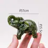 Pieza de talla de elefante de jade natural transfronteriza, Adorno auspicioso de elefante pequeño para sostener en la mano, Manualidades de cristal, Decoración de escritorio al por mayor