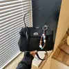 Bolso de hombro cruzado de moda de alta gama para el trabajo, diseño exclusivo con cierre, para el otoño de 2026, transfronterizo