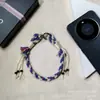 Lanyard de teléfono colorido tejido a mano, correa de muñeca de estilo étnico, cordón anti-pérdida con borla y cuenta, adorno colgante para funda de teléfono, venta al por mayor