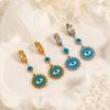 Pendientes de ojo de diablo exóticos de moda con personalidad europea y americana, diseño de nicho de estilo ins, pendientes de acero de titanio de alta calidad.