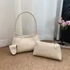 Bolso tejido de verano transfronterizo para mujer, bolso de mano de moda, bolso de hombro, bolso para vacaciones en la playa, bolso tipo cubo de diseño nicho