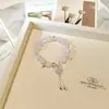 Pulsera de Flor de Lirio del Valle Súper Popular para Mujer Ins Trendy Mejor Amiga Estilo Antiguo Pulsera Dulce Estudiante Simple Versátil Joyería para Mano