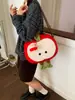 Bolsa de Tote de Peluche de Manzana Linda 2025 Nuevo Otoño e Invierno Nicho Versátil Bolso de Mano Dibujos Animados Gran Capacidad Bolso de Hombro