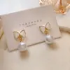 Populares Aretes de Mariposa con Goteo de Aceite, Aretes de Perlas de Alta Calidad, Tendencia Celebridad Retro Francés Nicho Fabricante de Aretes Venta al por Mayor