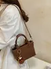 Otoño 2026 Nuevo Estilo Coreano Bolso de Mano Sencillo Bolso Cubo Sencillo de Moda Bolso de Hombro Único con Textura Bolso Cruzado