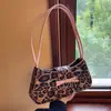 Bolso Baguette Niche Elegante de Moda con Lazo de Leopardo Francés Nuevo Casual para Combinar con Todo Bolso de Hombro Bajo el Brazo para Mujer