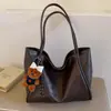 Bolsa de Ombro Simples de Grande Capacidade Transfronteiriça Feminina 2026 Nova de Alta Qualidade Versátil Bolsa Tote de Mão Casual para o Dia a Dia