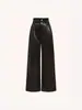Pantalones retro de cuero PU de color negro transfronterizos para mujer, estilo chica popular de la calle, pantalones de pierna ancha de color liso desgastados para mujer, envío directo de una pieza