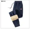 Calças grossas forradas de lã masculinas, calças esportivas largas e casuais plus size, calças de moletom da moda para atividades ao ar livre, calças retas