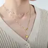 Collar de perlas de diseño de nicho de personalidad simple de alto grado de nuevo estilo francés, colgante de acero de titanio, cadena para la clavícula, joyería versátil