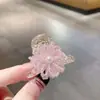 Exquisito y de Alta Gama Clip Pequeño de Flor de Perla para Mujer 2026 Nueva Moda Versátil Pinza para Cola de Caballo o Medio Recogido