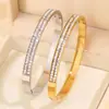 Pulsera de Acero de Titanio, Pulsera de Lujo Doble Fila Estrella Dorada para Mujer, Joyería de Pulsera de Moda Transfronteriza Nicho Versión de Alta Gama