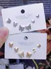 Set de Aretes Mariposa Corazón Estilo Lujo Nuevo Cruzado para Mujer Diseño de Nicho Único Sentido de Diseño Lujo Ligero Adornos Brillantes de Diamante para Oreja