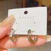 Pendientes geométricos cuadrados de metal simples, elegantes y únicos para mujer, con un diseño distintivo, versátiles para el uso diario, pendientes populares en línea