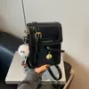 Bolso Casual de Teléfono Móvil de Moda para Mujer 2026 Otoño Nuevo Retro Versátil Texturizado Hombro Cruzado Pequeño Cuadrado