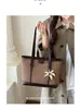 Bolso de mezclilla transfronterizo de gran capacidad para mujer, nuevo modelo de verano 2026, bolso de hombro simple y elegante para el trabajo y los desplazamientos, bolso tote