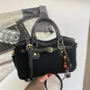Bolsa colgante de adorno con estampado de leopardo miu de alta gama para mujer, nuevo estilo 2026, bolso de mano retro de un solo hombro, bolso cruzado versátil para el trabajo