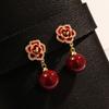 Nuevos Pendientes de Perlas de Camelia Roja Otoño e Invierno Pendientes para Mujer Placa de Incienso Antimosquitos Sin Agujero en la Oreja Pendientes Elegantes de Alta Calidad