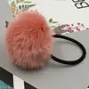 Anillo para el pelo de bola de pelo de imitación de conejo multicolor coreano al por mayor explosiones de Taobao fábrica directa de tocados accesorios para el cabello cuerda para tocado